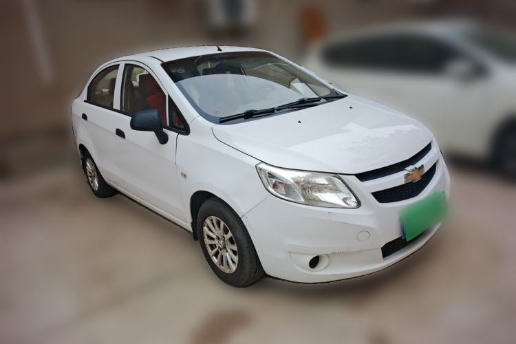 Used Chevrolet Sail 2013 Sedan 1.2L Manual Fashionable Happiness Edition Front Right 45 Deg