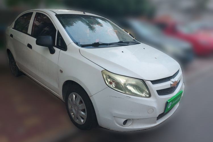 Used Chevrolet Sail 2013 Sedan 1.4L Manual Ideal Happiness Edition Front Right 45 Deg