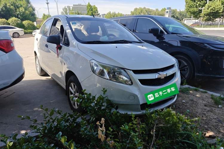 Used Chevrolet Sail 2013 Sedan 1.2L Manual Fashionable Happiness Edition Front Right 45 Deg