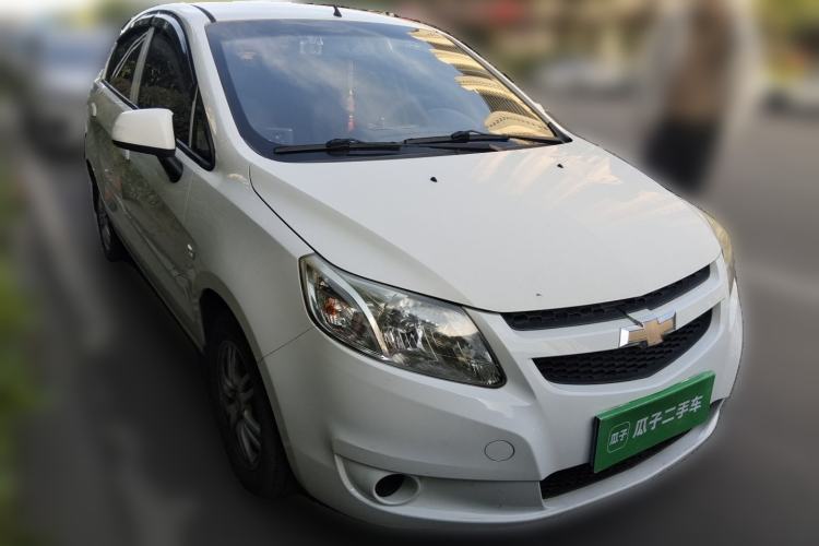 Used Chevrolet Sail 2013 Sedan 1.4L Manual Ideal Happiness Edition Front Right 45 Deg