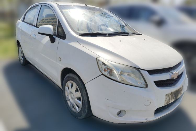 Used Chevrolet Sail 2013 Sedan 1.4L Manual - Youyi Happiness Edition Front Right 45 Deg