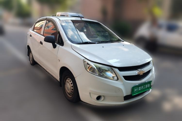 Used Chevrolet Sail 2013 Sedan 1.2L Manual Fashionable Happiness Edition Front Right 45 Deg