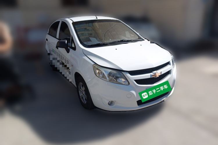 Used Chevrolet Sail 2013 Sedan 1.2L Manual Fashionable Happiness Edition Front Right 45 Deg