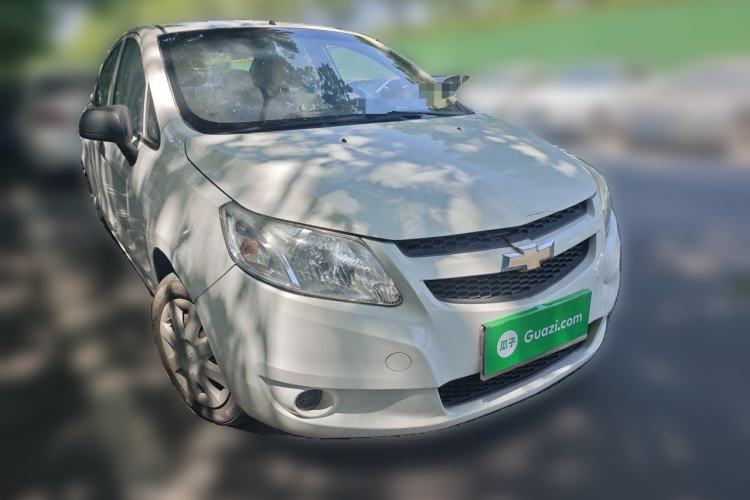 Used Chevrolet Sail 2013 Sedan 1.4L Manual Ideal Happiness Edition Front Right 45 Deg