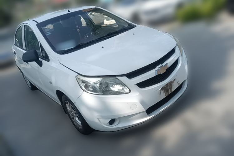 Used Chevrolet Sail 2013 Sedan 1.4L Manual Ideal Happiness Edition Front Right 45 Deg