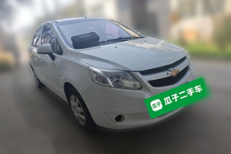 Used Chevrolet Sail 2013 Sedan 1.4L Manual Ideal Happiness Edition Front Right 45 Deg