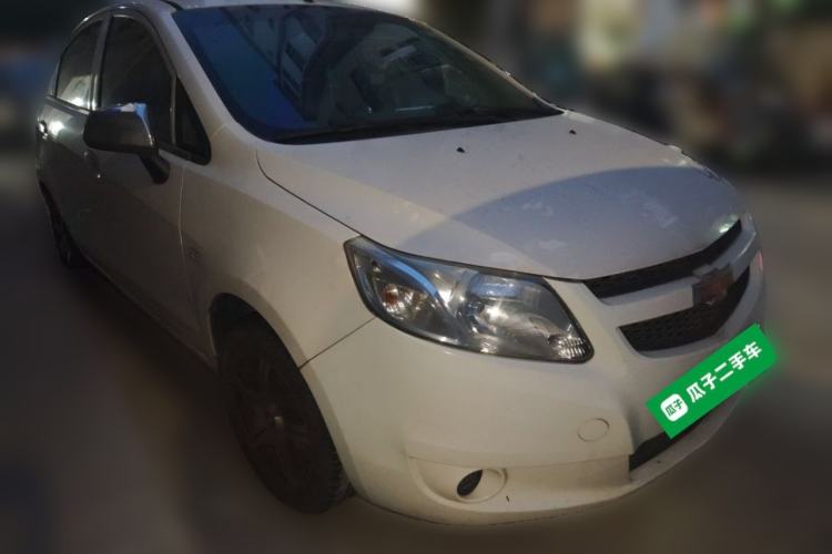 Used Chevrolet Sail 2013 Sedan 1.4L Manual Ideal Happiness Edition Front Right 45 Deg