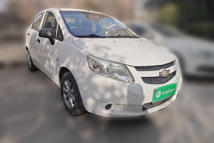 Used Chevrolet Sail 2013 Sedan 1.2L Manual Fashionable Happiness Edition Front Right 45 Deg