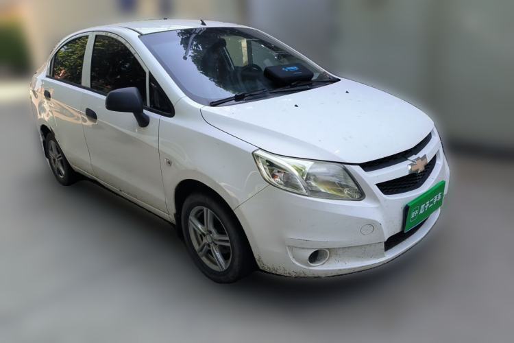 Used Chevrolet Sail 2013 Sedan 1.4L Manual Ideal Happiness Edition Front Right 45 Deg