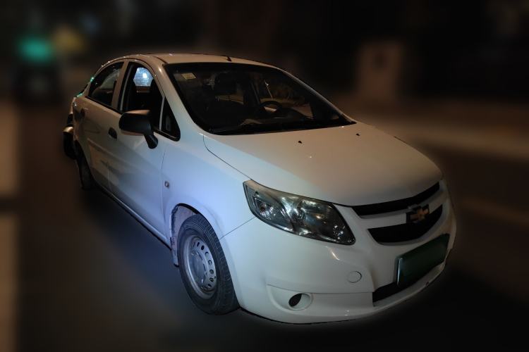 Used Chevrolet Sail 2013 Sedan 1.2L Manual Fashionable Happiness Edition Front Right 45 Deg