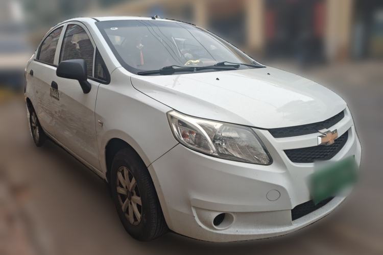Used Chevrolet Sail 2013 Sedan 1.2L Manual Fashionable Happiness Edition Front Right 45 Deg