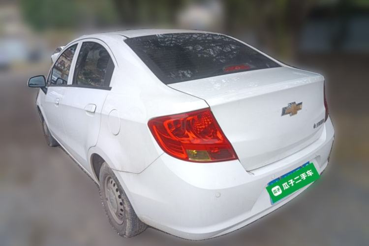 Used Chevrolet Sail 2013 Sedan 1.2L Manual Fashionable Happiness Edition Rear Left 45 Deg