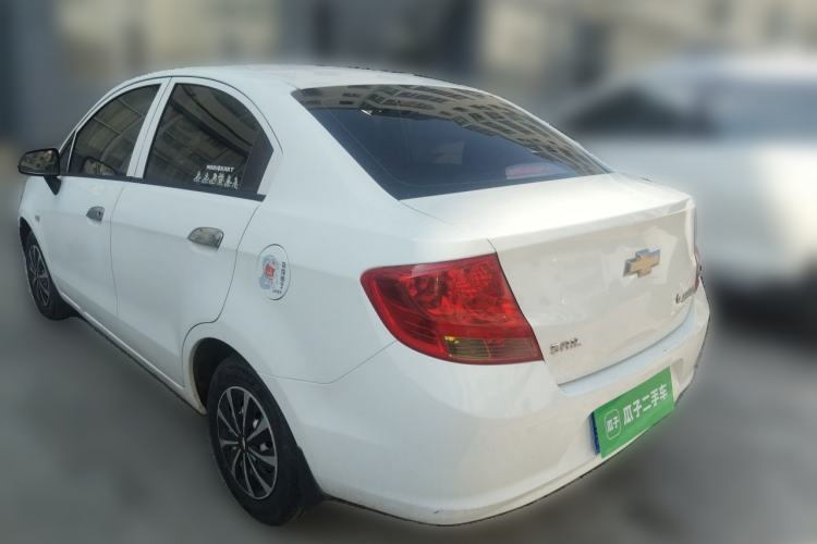 Used Chevrolet Sail 2013 Sedan 1.2L Manual Warm Edition Rear Left 45 Deg