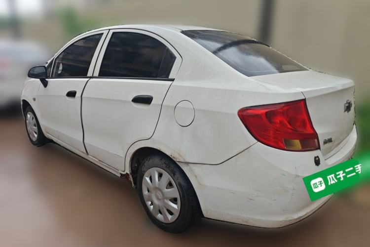 Used Chevrolet Sail 2013 Sedan 1.2L AMT Ideal Edition Rear Left 45 Deg