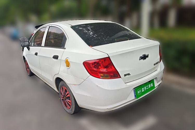 Used Chevrolet Sail 2013 Sedan 1.2L Manual Warm Edition Rear Left 45 Deg