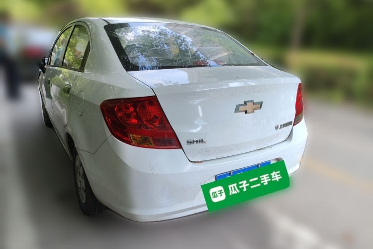 Used Chevrolet Sail 2013 Sedan 1.2L Manual Fashionable Happiness Edition Rear Left 45 Deg