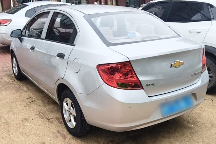 Used Chevrolet Sail 2013 Sedan 1.2L Manual Fashionable Happiness Edition Rear Left 45 Deg