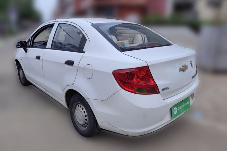 Used Chevrolet Sail 2013 Sedan 1.2L Manual Fashionable Happiness Edition Rear Left 45 Deg