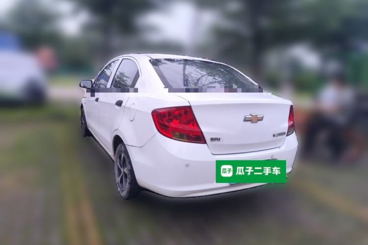 Used Chevrolet Sail 2013 Sedan 1.2L Manual Fashionable Happiness Edition Rear Left 45 Deg