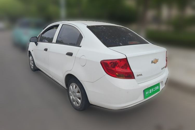 Used Chevrolet Sail 2013 Sedan 1.4L Manual Ideal Happiness Edition Rear Left 45 Deg