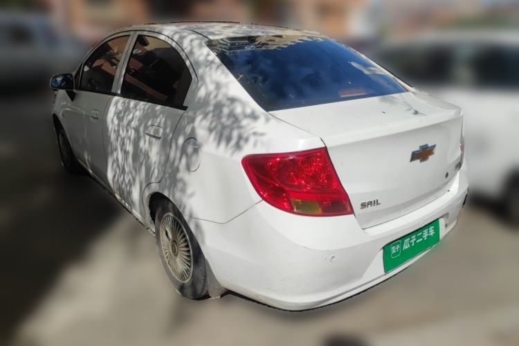 Used Chevrolet Sail 2013 Sedan 1.4L Manual Ideal Happiness Edition Rear Left 45 Deg