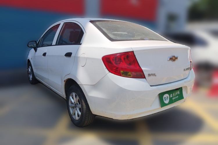 Used Chevrolet Sail 2013 Sedan 1.2L Manual Fashionable Happiness Edition Rear Left 45 Deg