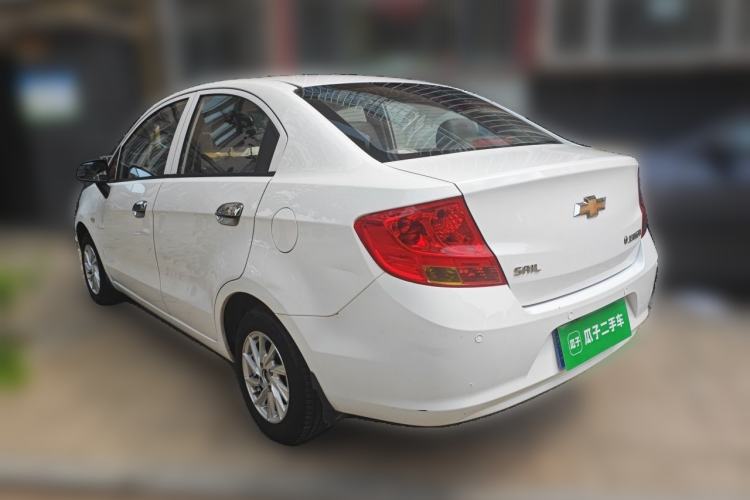 Used Chevrolet Sail 2013 Sedan 1.2L Manual Fashionable Happiness Edition Rear Left 45 Deg