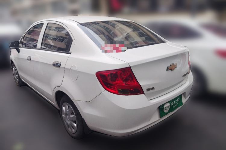 Used Chevrolet Sail 2013 Sedan 1.4L Manual Ideal Happiness Edition Rear Left 45 Deg