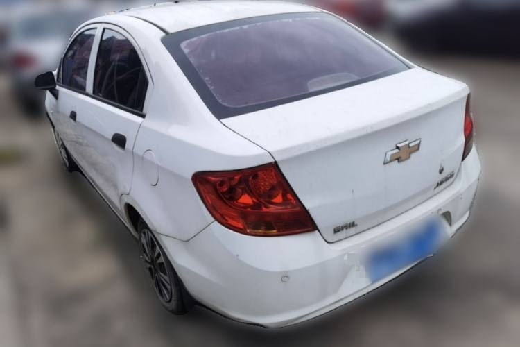 Used Chevrolet Sail 2013 Sedan 1.4L Manual Ideal Happiness Edition Rear Left 45 Deg