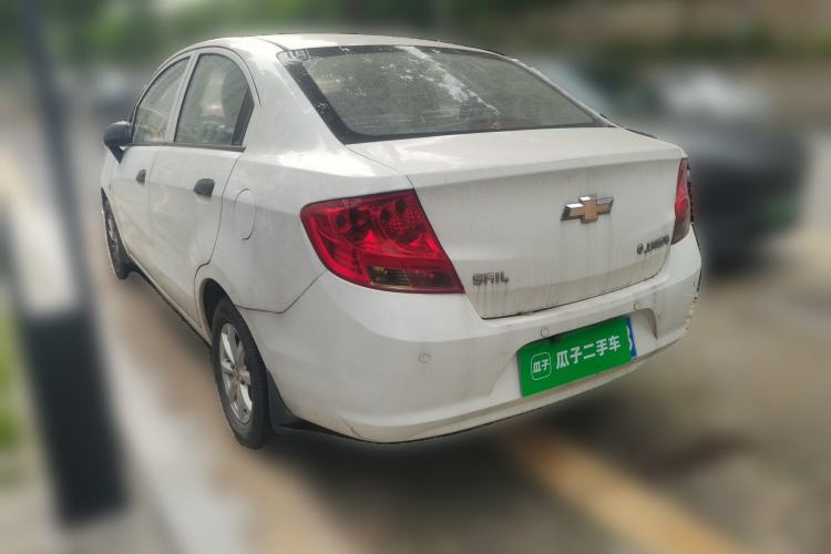 Used Chevrolet Sail 2013 Sedan 1.2L Manual Fashionable Happiness Edition Rear Left 45 Deg