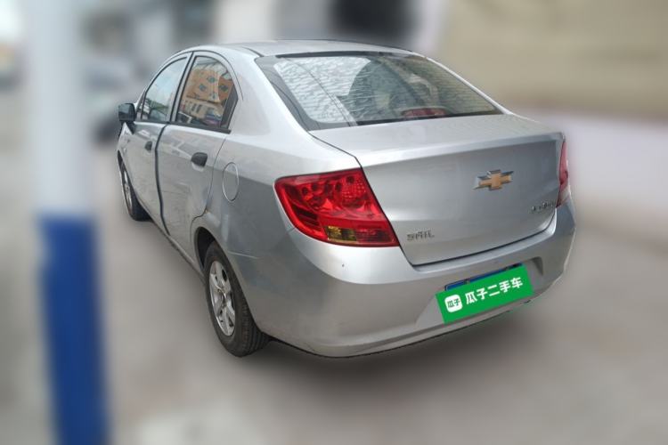 Used Chevrolet Sail 2013 Sedan 1.2L Manual Warm Edition Rear Left 45 Deg