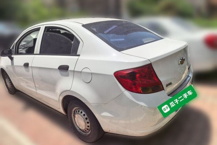Used Chevrolet Sail 2013 Sedan 1.2L Manual Fashionable Happiness Edition Rear Left 45 Deg