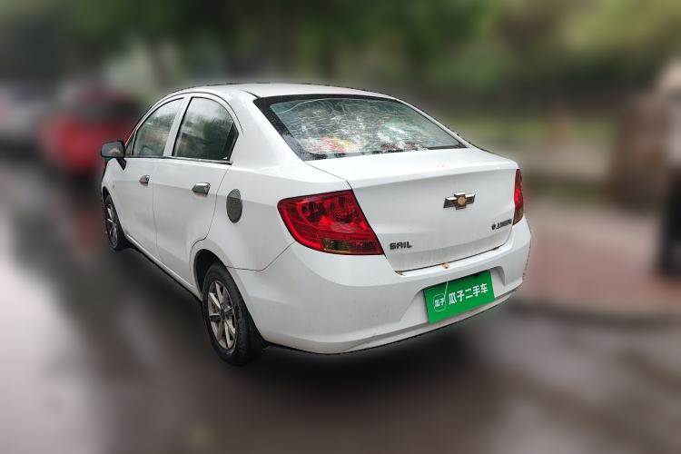 Used Chevrolet Sail 2013 Sedan 1.2L Manual Happiness Edition Rear Left 45 Deg