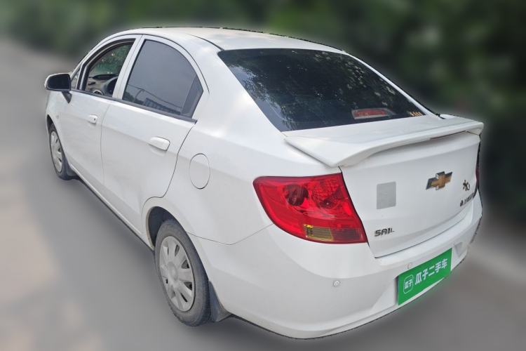 Used Chevrolet Sail 2013 Sedan 1.4L Manual Ideal Happiness Edition Rear Left 45 Deg