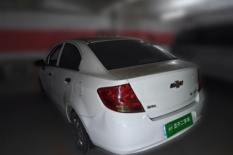 Used Chevrolet Sail 2013 Sedan 1.4L Manual Ideal Edition Rear Left 45 Deg
