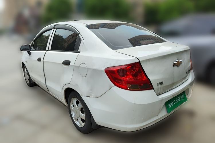Used Chevrolet Sail 2013 Sedan 1.4L Manual Ideal Happiness Edition Rear Left 45 Deg