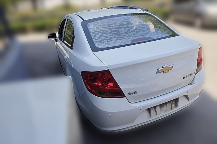 Used Chevrolet Sail 2013 Sedan 1.4L Manual Elegance Edition Rear Left 45 Deg