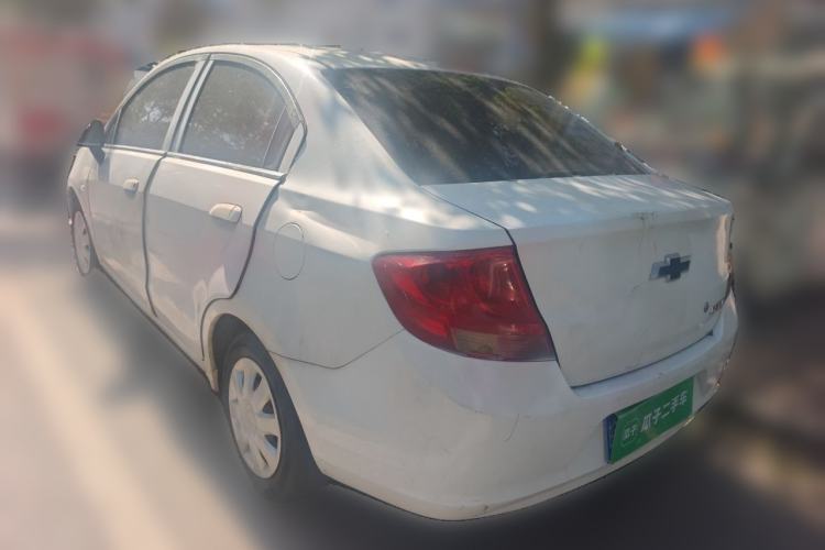 Used Chevrolet Sail 2013 Sedan 1.4L Manual Ideal Happiness Edition Rear Left 45 Deg