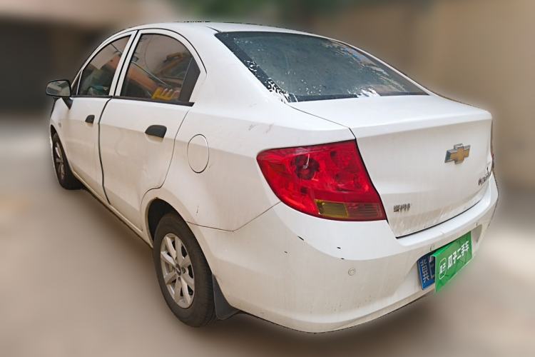 Used Chevrolet Sail 2013 Sedan 1.2L Manual Fashionable Happiness Edition Rear Left 45 Deg