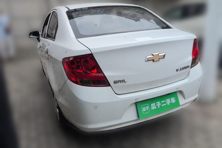 Used Chevrolet Sail 2013 Sedan 1.4L Manual Ideal Happiness Edition Rear Left 45 Deg