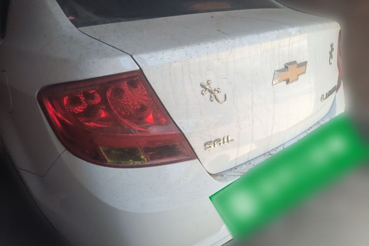 Used Chevrolet Sail 2013 Sedan 1.2L Manual Fashionable Happiness Edition Rear Left 45 Deg