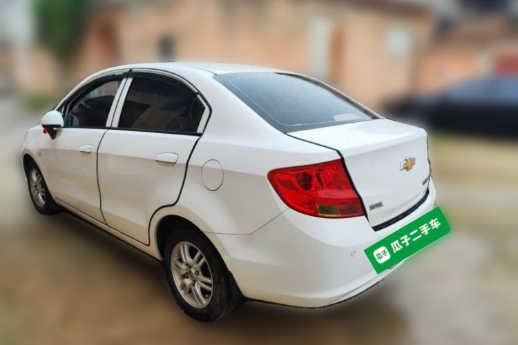Used Chevrolet Sail 2013 Sedan 1.4L Manual Happiness Edition II Rear Left 45 Deg