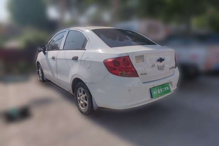 Used Chevrolet Sail 2013 Sedan 1.2L Manual Fashionable Happiness Edition Rear Left 45 Deg