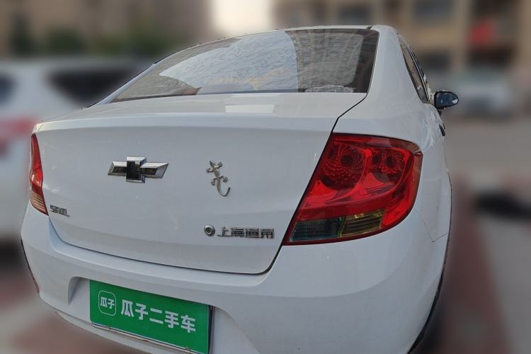 Used Chevrolet Sail 2013 Sedan 1.2L Manual Fashionable Happiness Edition Rear Left 45 Deg
