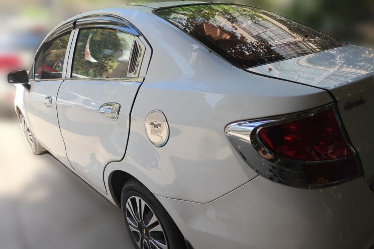 Used Chevrolet Sail 2013 Sedan 1.4L Manual Happiness Edition II Rear Left 45 Deg