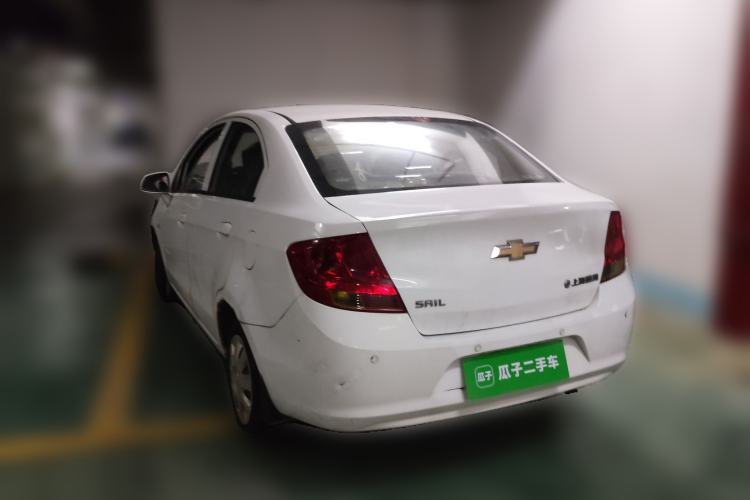 Used Chevrolet Sail 2013 Sedan 1.4L Manual Ideal Happiness Edition Rear Left 45 Deg