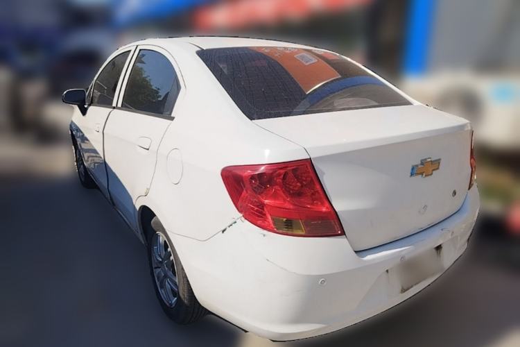 Used Chevrolet Sail 2013 Sedan 1.4L Manual Happiness Edition II Rear Left 45 Deg