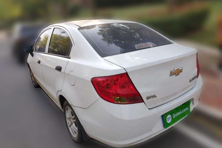 Used Chevrolet Sail 2013 Sedan 1.4L Manual Ideal Edition Rear Left 45 Deg