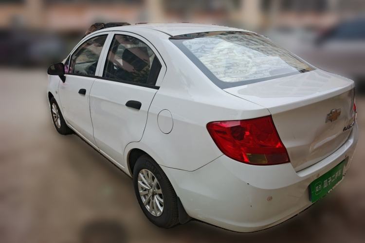 Used Chevrolet Sail 2013 Sedan 1.2L Manual Fashionable Happiness Edition Rear Left 45 Deg
