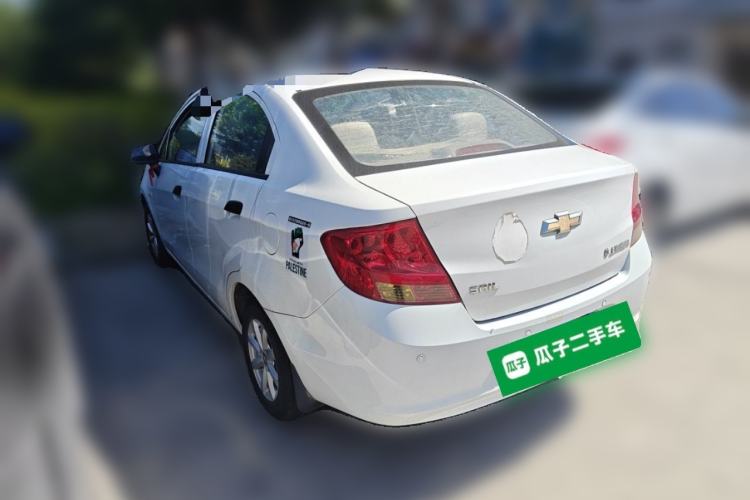 Used Chevrolet Sail 2013 Sedan 1.2L Manual Fashionable Happiness Edition Rear Left 45 Deg